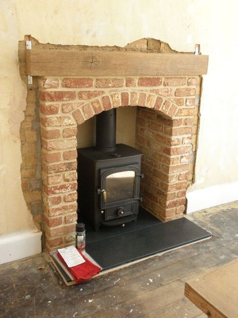 Brick Arch Fireplace, Fireplace Arch, Corner Brick Fireplaces, Arch Fireplace, Exposed Brick Fireplaces, Woodburning Stove Fireplace, Wood Burner Fireplace, Log Burner Fireplace, Log Burner Living Room