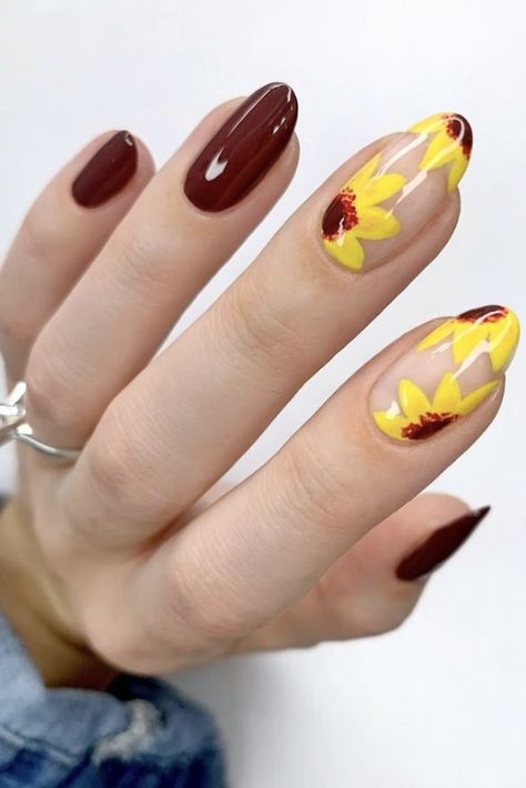 Oval Sunflower Nails, Yellow Red Nails Art Designs, Black Eyed Susan Nails, Burgundy Nails With Sunflower, Maroon Sunflower Nails, Burgundy Sunflower Nails, Nail Designs Maroon, Dark Maroon Nails, Maroon Nail Ideas