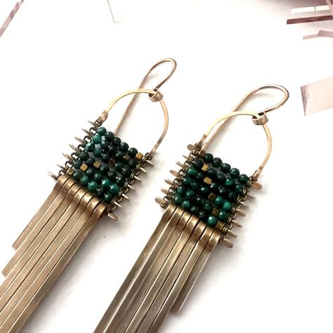 Forest green, Malachite and gold Hematite beads in the classic asymmetrical earrings with brass fringe. Length: 2.75"Width: .5" Asymmetrical Earrings, Green Malachite, Hematite Beads, Forest Green, Forest, Brass, Beads, Green, Gold