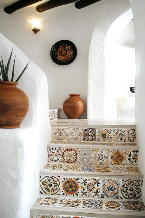 Entryway Ideas Spanish Style, Spanish Tile Accent Wall, Spanish Tile Entryway, Spanish Tiles On Stairs, Spain Home Decor Spanish Style, Spanish Style Home Design, Spanish Pottery Decor, Spanish Style Artwork, Organic Modern Spanish Decor