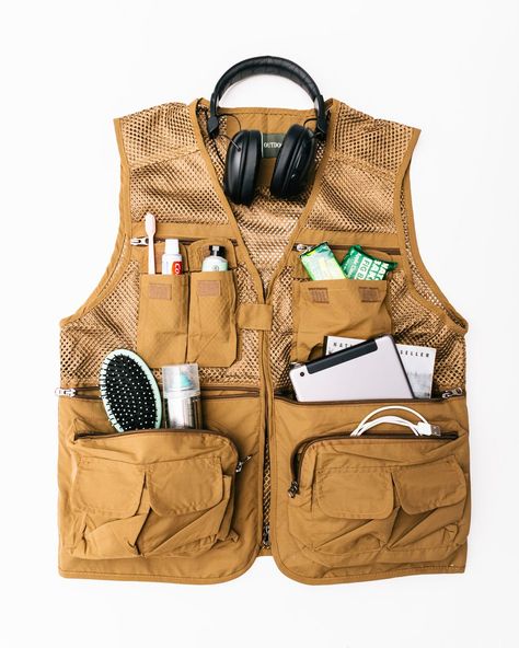 Hate Baggage Fees? Wear a Fishing Vest on the Plane - WSJ Fishing Vest Outfit, Vest Styling, Fishing Clothes, Cheap Vacations, Fishing Vest, Utility Vest, On The Plane, Wardrobe Update, Styling Inspiration