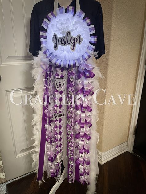 Purple Hoco Mums, Purple Mums Homecoming, Senior Mums Homecoming White And Light Purple, Purple And Gold Homecoming Mums, Purple Gold And White Homecoming Mums, Homecoming Jeans Ideas, Hoco Mum Chains, Purple Mums, Homecoming Mums Senior