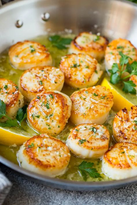 Seared scallops with a garlic and herb butter sauce. An easy and elegant dinner! #seafood #dinner #dinneratthezoo Frozen Scallops, Dinner Seafood, Scallops Recipe, Easy Dinner Options, Dried Scallops, Pan Seared Scallops, Delicious Seafood Recipes, Seared Scallops, Sea Scallops