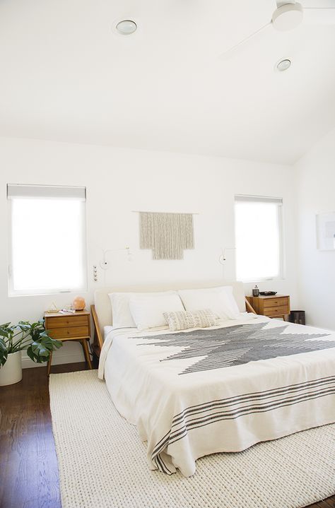 A lovely bright master bedroom with Rugs USA's Textures Braided BD01 rug!