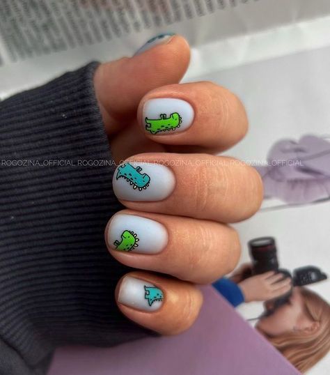 T Rex Nail Art, Dino Inspired Nails, Nail Designs Dinosaur, Nail Ideas Dinosaur, Nails With Dinosaur, Dinosaur Gel Nails, Dinosaur Themed Nails, Dinasour Nail Designs, Nail Art Dinosaur