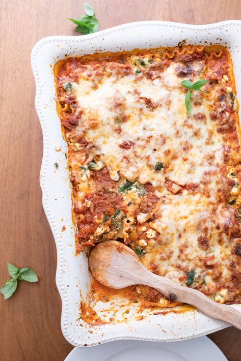 You need this healthy lasagna recipe - friends and strangers have called it "the BEST lasagna recipe EVER"! I’ve been improving this recipe for over 15 years. It’s a much healthier lasagna recipe now! You might know, I’m a former Registered Dietitian, so it’s in my job description to pump everything I can with nutrients. But, I’m also a real person who won’t sacrifice taste for nutrition. This recipe is a nice balance of the two. Healthy Homemade Lasagna, Lasagna Recipe High Protein, Best Healthy Lasagna Recipe, Healthy High Protein Lasagna, High Protein Lasagna Recipe, Bison Lasagna Recipe, Healthier Lasagna Recipe, Easy Healthy Lasagna Recipe, Healthy Lasagna Recipes Clean Eating