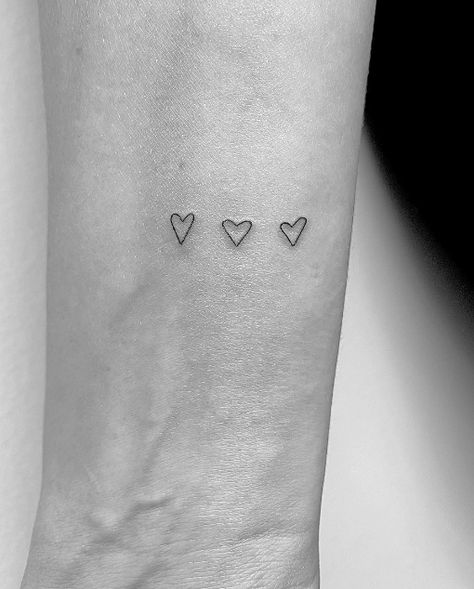 Hearts By Family Tattoo, Two Love Heart Tattoo, 3 Love Hearts Tattoo, Simplicity Tattoo Ideas, Hearts On Arm Tattoo, Three Tiny Heart Tattoo, Handwritten Heart Tattoo, Family Hearts Tattoo, Fine Line Family Tattoo