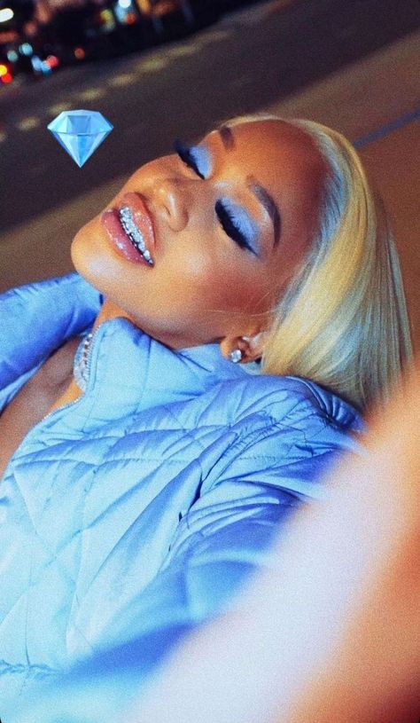 Blue aesthetic , grillz , baddie aesthetic , blue mood , fashionable , blonde hairstyles , pretty girls      Saweetie Female rappers celebrities Icy Girl Aesthetic, Blue Grillz, Saweetie Grills, Saweetie Makeup, Saweetie Aesthetic, Saweetie Mood, Saweetie Outfits Icy, Saweetie Polaroid Photoshoot, Saweetie Aesthetic Pink