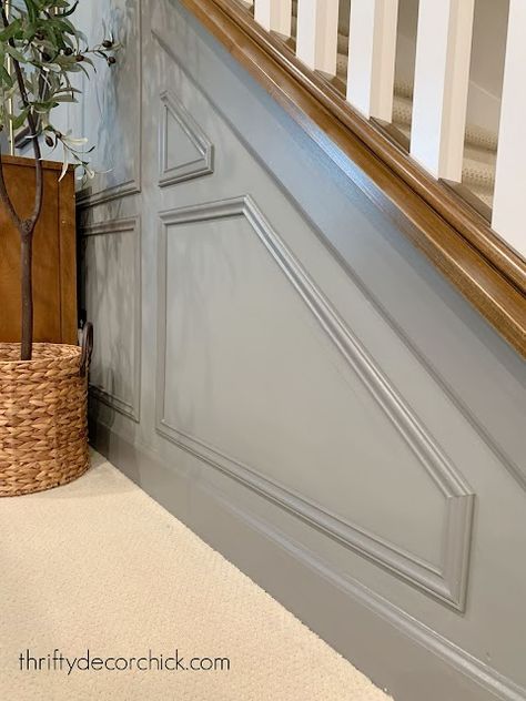 Use molding to add interest to basic walls | Thrifty Decor Chick | Thrifty DIY, Decor and Organizing Side Of Stairs, Picture Frame Trim, Stair Moulding, Staircase Molding, Decorative Wall Molding, Stairs Trim, Picture Molding, Frame Molding, Wall Paneling Diy