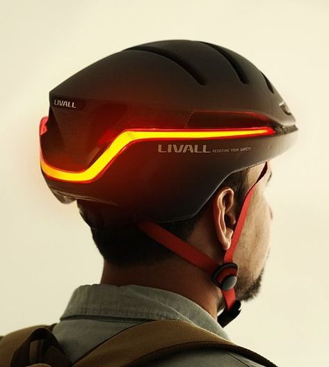 Stay safer on the road by wearing the LIVALL EVO21 Smart Helmet. Designed for cyclists who like to reach top speeds, it has a 270º V-shaped rear light that indicates your direction and braking. Furthermore, it has an integrated SOS system that works with your smartphone to call emergency services with your geolocation. Moreover, with your speed in mind, it draws its sculpted look from time trial aero helmets, optimizing aerodynamics. Smart Helmet, Helmet Design, Bicycle Helmet, Cycling, Bicycle, Bike, Hats, Design