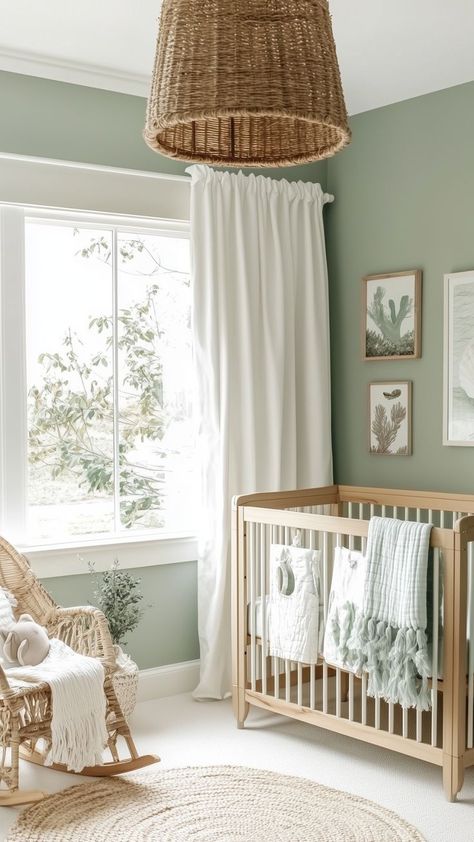 Serene green nursery with natural wood crib, wicker decor, and soft sage tones for a calming, nature-inspired feel. Light Green Nursery, Sage Walls, Green Nursery Ideas, Sage Green Nursery, Peaceful Green, Green Baby Room, Wood Crib, Sage Green Walls, Baby Room Inspiration