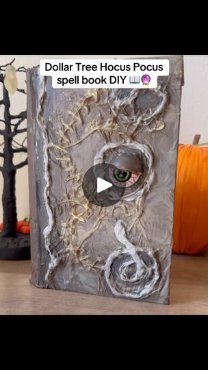 340 reactions · 14 comments | How to create this DIY Hocus Pocus spell book using only items from the @dollartree! I love how it turned out!!🤩👁️📖🔮👻🎃  Materials needed:  🔮Hard cover book 🔮Eye balls 🔮tissue paper 🔮mod podge  🔮paint (brown, white, yellow) 🔮hot glue gun + glue sticks  The end result came out way better than I expected, and I only spent $2.50 on materials to make it! (Already had other items around the house.)😉🤗  What are your thoughts on this DIY?🤩👻 . . . . . . . . . . . . . . . . . . . . . . . . #sandersonsisters #witches #dollartreediy  #hocuspocus #hocuspocus2 #hocuspocusparty #hocuspocusmovie spellbook #spells #dollartree #halloweendecor #diy #craft #halloween #halloweendecor #halloweendecorations #dupe  #bookstagram #trending #ghost #dollarstore #falldecor Diy Halloween Spell Book Covers, Hocus Pocus Book Diy, Diy Spell Book Cover, Diy Hocus Pocus Spell Book, Spellbook Diy, Spell Book Diy, Diy Halloween Spell Book, Diy Hocus Pocus, Hocus Pocus Book