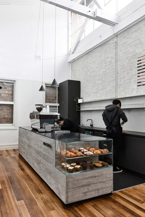 Minimal Space, Maximum Impact at DUX Coffee — Design Anthology Concrete Coffee Shop, Minimal Cafe Design, Minimal Coffee Shop, Minimal Cafe, Coffee Shop Counter, Concrete Bar, Cafe Counter, Coffee Counter, Design Anthology