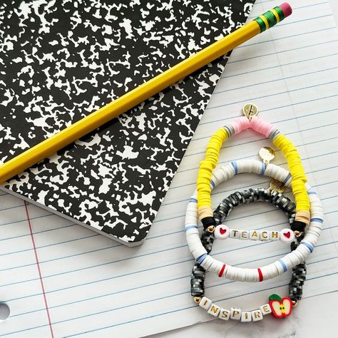 It’s back to school month!! 🍎✏️📓Which means…new items headed your way! First up - First day of school teacher gift! This set of 3 bracelets will come on a cute card and fun ribbon to attach! $35 for the set! First Day Of School Teacher, Teacher Bracelet, Teacher Accessories, Cake Banner Topper, Kids Notebook, Paper Gift Tags, School Teacher Gifts, A Pencil, Crafty Craft