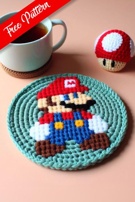 Crochet Mario Coaster Pattern Mario Crochet Ideas, Nintendo Crochet Patterns Free, Crochet Pattern Coaster, Crochet Gifts For Gamers, Crochet Gaming Accessories, Video Game Crochet Patterns Free, Cute Crochet Coasters Free Pattern, Crochet Coaster Ideas, Video Game Crochet Patterns