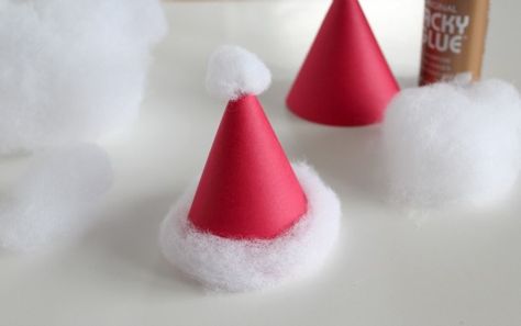 Making a mini paper Santa hat - could be made from felt S Is For Santa, Santa Claus Crafts, Toddlers Activities, Preschool Winter, Paper Hats, Santa Crafts, Christmas Hats, Paper Hat, Santa Hats