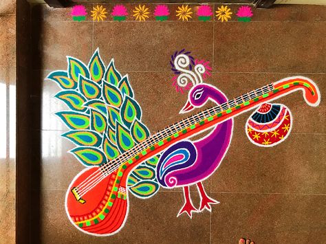 #Saraswathipoojai #rangoli #2017 #momsidea #love #peacock n #veena Peacock Rangoli, Festival Rangoli, Padi Kolam, Rangoli Designs Diwali, Diwali Rangoli, Tanjore Painting, Simple Rangoli, Music For Kids, Rangoli Designs