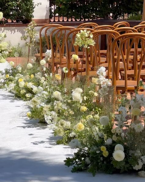 Large Aisle Arrangements, Meadow Inspired Wedding, Back Of Aisle Arrangements, Wedding Florals Greenery, Wedding Ceremony Florals On Ground, Grounded Aisle Arrangements, Yellow Wedding Ceremony, Grounded Flower Arch, Grounded Arch