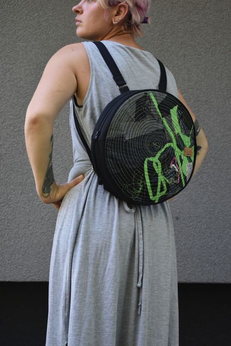 This is a one of a kind sustainable round Backpack. It is crafted with nicety and made from absolute waste - mixed fabric scraps, leftover threads, clothing labels. Nonwoven fabric holds round shape even when the backpack is fully stuffed or completely empty. This colorful and lightweight backpack is perfect for summer season, street wear, cultural event or everyday use. Two extra pockets inside to keep smaller items, such as keys, lip-gloss or phone away from the main compartment. Colorful Streetwear, Sewing Handbag, Colorful Backpacks, Practical Bag, Lightweight Backpack, Old Jeans, Cultural Events, Clothing Labels, Accessories Branding