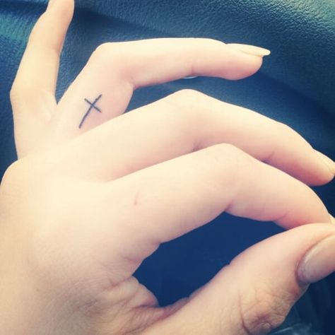 63 Unique Ideas Of Cross Tattoo Designs For Women With Meaning Finger Tattoo Meaning, Cross Finger Tattoos, Ring Finger Tattoo, Unique Cross Tattoos, Small Cross Tattoos, Small Cross Tattoo, Tattoo Sites, Tiny Finger Tattoos, Tattoo For Boyfriend