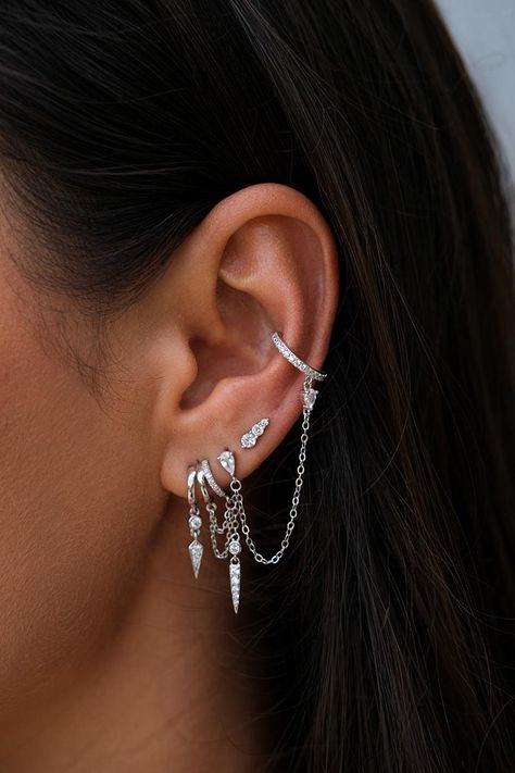 Silver Earring Stack 3 Holes, Chain Ear Piercings, Helix Placement, Ear Cuff Aesthetic, Elegant Piercings, Silver Ear Stack, Silver Earring Stack, Celebrity Ear Piercings, Earrings Stack