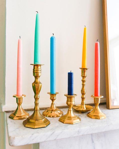 Taper candles in brass candlesticks on a fireplace mantel Candle Stick Decor Ideas, Taper Candles Wedding, Colored Taper Candles, Gold Candlestick Holders, Dinner Party Wedding, Candle Candelabra, Candle Stick Decor, Twinkly Lights, Pretty Candle