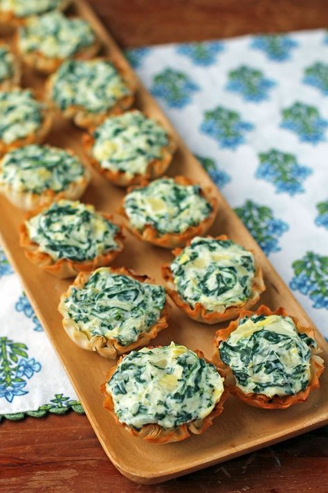 Spinach Artichoke Dip Tartlets - Emily Bites Spinach Artichoke Tarts, Mini Salad Cups Appetizer Ideas, Spinach Bites Appetizers, Mini Tart Appetizers, Healthy Hors D’oeuvres, Green Appetizers, Spinach Dip Bites, Easy Spinach Artichoke Dip, Artichoke Bites