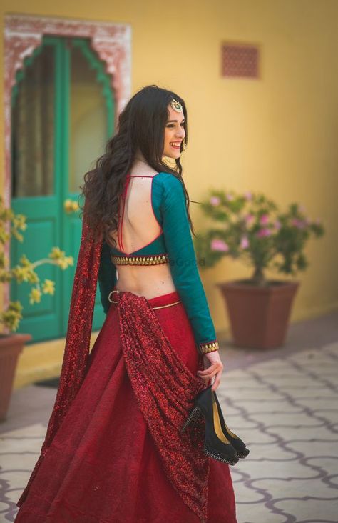 Photo of red bridal lehenga Lehenga Outfit, Red Bridal Lehenga, Blouse Designs Catalogue, Saree Blouse Neck Designs, Backless Blouse Designs, New Saree Blouse Designs, Fashionable Saree Blouse Designs, Sari Blouse Designs, Indian Saree Blouses Designs