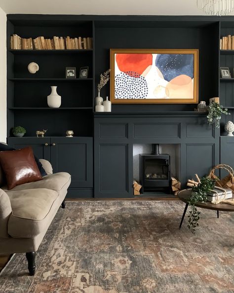 Ruth on Instagram: “Transformation Tuesday , light to dark ➡️ Our built-ins got a makeover recently by adding a fireplace and painting in Midnight Blue by…” Dark Blue Fireplace, Adding A Fireplace, Dark Home Office, Bookshelves Around Fireplace, Built In Wall Shelves, Tudor House Exterior, Painted Built Ins, Office With Fireplace, Blue Sofas Living Room