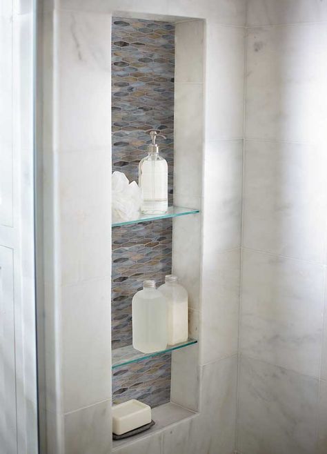 Take a look at this beautiful shower highlighting Grecian White Polished Marble tiles. For visual continuity, marble tiles can be used as flooring. Hexagon Tile Backsplash, Interlocking Tile, Mosaic Backsplash, Shower Niche, Shower Surround, Kitchen Mirror, Glass Mosaic Tiles, Shower Design, Glass Mosaic