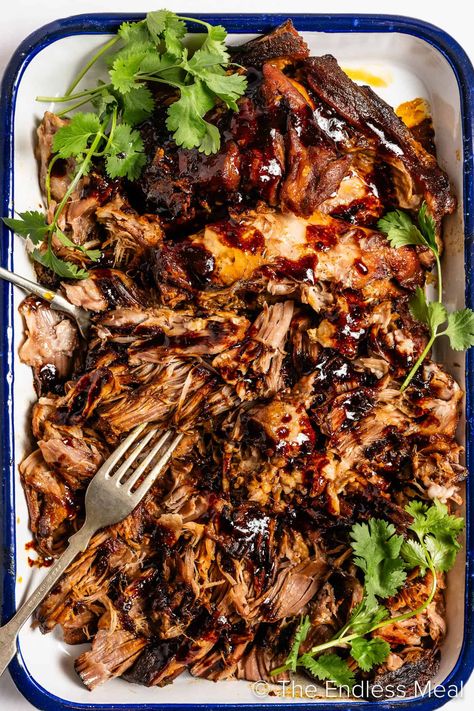 This flavor-packed Korean pulled pork is slow cooked in a delicious marinade of Korean gochujang, soy sauce, honey, and chicken stock. #theendlessmeal #pulledpork Korean Pulled Pork, Gochujang Pork, Housewife Life, Super Easy Dinner, Crockpot Pork, Asian Foods, Slow Cooked, Chicken Stock, Main Meals