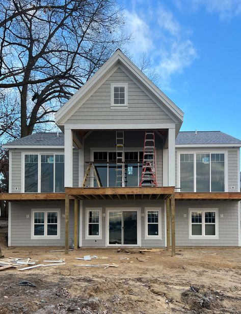 Lake House Construction Update - The Lilypad Cottage Lilypad Cottage, Warm Wood Flooring, Lake House Remodel, Trim Work, House Construction, Vacation House, Cafe Tables, Window Installation, Front Entry