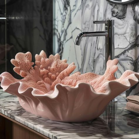 Coral shaped bathroom basins are exquisite fixtures that bring a touch of nature’s beauty into bathroom design. Inspired by the delicate and intricate structures of coral reefs, these basins often feature flowing, organic lines and textures that evoke the underwater world. Crafted from materials like ceramic, glass, or stone, coral shaped bathroom basins not only enhance the aesthetics of the space but also offer practical functionality. They can be found in various colors and finishes, from ... Underwater Ceramics, Coral Pottery, Underwater Bathroom, Bathroom Basins, Ceramic Pendant Light, Organic Lines, Coral Reefs, Bathroom Basin, Ceramic Pendant