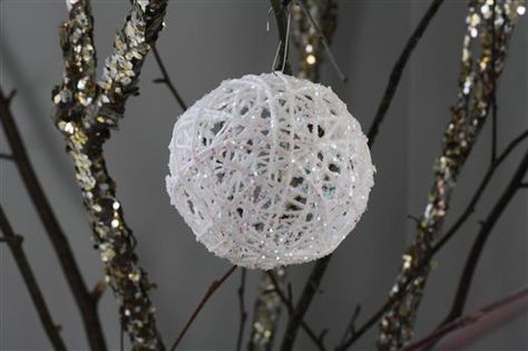 best version of this i've seen! i've seen them with colored yard, sans glitter also. despite a few warnings i've received, i am trying these. oh yes. i am. Peppermint Candy Ornaments, Snowball Ornament, Tea Light Snowman, Globe Ornament, Navidad Diy, Wood Christmas Ornaments, Kids Ornaments, Xmas Crafts, Personalized Christmas Ornaments