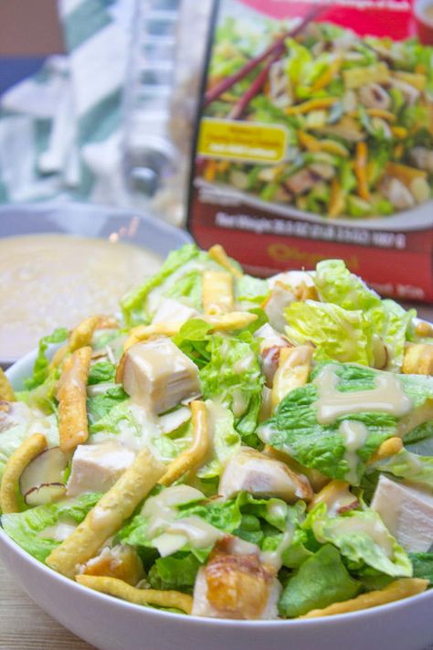 Complete with a Chinese chicken salad dressing, this copycat recipe contains all the flavors of the Costco Chinese-Style Salad Kit at a fraction of the price. If you're a fan of Costco, then there's no doubt that you'll love this Copycat Costco Chinese Chicken Salad. One of the tastiest Chinese chicken recipes around, this Costco copycat ensures that you may never have to drive to the store again. Grab your ingredients and get started on an Asian chopped salad that will save your truck-fulls of Costco Chicken Salad, Chinese Chicken Salad Dressing, Costco Copycat, Chinese Salad, Chicken Salad Dressing, Asian Salad Recipe, Asian Salad Dressing, Chinese Chicken Salad Recipe, Salad Kit