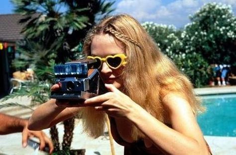 Holding A Camera, Girls With Cameras, Boogie Nights, Heather Graham, Ray Ban Sunglasses Outlet, Ray Ban Wayfarer, Hologram Stickers, Roller Girl, Shaped Sunglasses