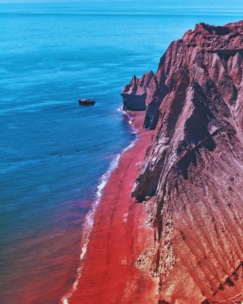 The Bloody beach is located in the south of the  Hormoz island. Since the beach of this part of the island is red, it is known as the Bloody Beach. The water that comes from the sea to the beach takes the redness of the soil and minerals.  Locals use these soils as spices in their foods. Souragh is one of these foods which the people cook with the red soil. In addition, you can see many other colors such as golden, silver and white soil in this beautiful Island. Hormoz Island, Hormuz Island, Rainbow Island, Iran Tourism, Visit Iran, Iran Pictures, Iran Travel, Red Beach, Countries To Visit