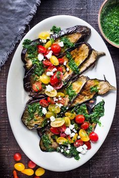 Grilled Eggplant Steaks with Fresh Tomato Relish and an Italian herb sauce called Gremolata. Keep it vegan or add crumbled cheese. A simple, healthy dinner recipe! #eggplant Feastingathome #grilledeggplant #gremolata #eggplantsteaks #eggplantrecipes #eggplantsteaks #healthydinner #meatlessdinner #vegan Eggplant Dinner Recipes, Eggplant Steaks, Eggplant Dinner, Recipe Eggplant, Healthy Eggplant, Healthy Dinner Recipe, Farmers Market Recipes, Tomato Relish, Italian Vegetables