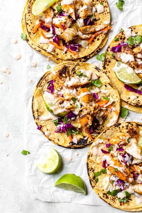 This easy, healthy fish taco recipe is made with cod seasoned with a chili-lime cumin rub topped with slaw – no breading, no frying! How To Cook Cod, Cod Fish Tacos, Fish Taco Recipe, Healthy Fish Tacos, Chili Lime Seasoning, Fish Taco, Fish Tacos Recipe, Taco Recipe, Eat Seasonal