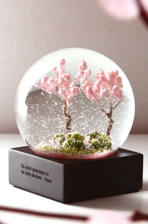 The end of spring lingers in the cherry blossoms End Of Spring, Water Globes, Crystal Figurines, Dessin Adorable, Cute Room Decor, Snow Globe, Paperweights, Cherry Blossoms, Music Box