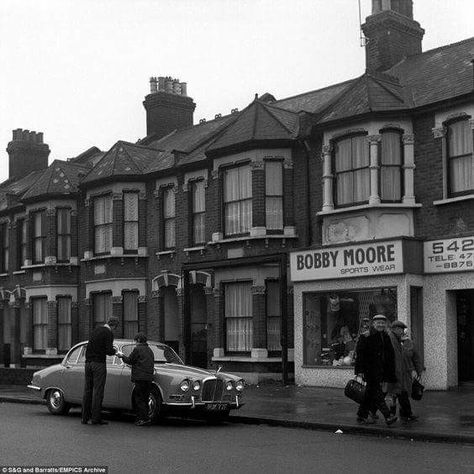 Bobby Moore's sports shop in green street upton park . The England captain can be seen signing an autograph beside his Jag. 1958 World Cup, Brian Clough, Bobby Moore, London Streets, Hampden Park, West Ham United Fc, East End London, Beatles Music, Store Room