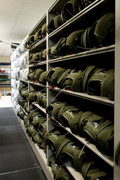 military gear storage shelving Military Gear Storage, Medical Supply Organization, Military Store, Military Bunkers, Gear Storage, Pull Out Shelves, Shelving Solutions, Custom Shelving, Military Soldiers