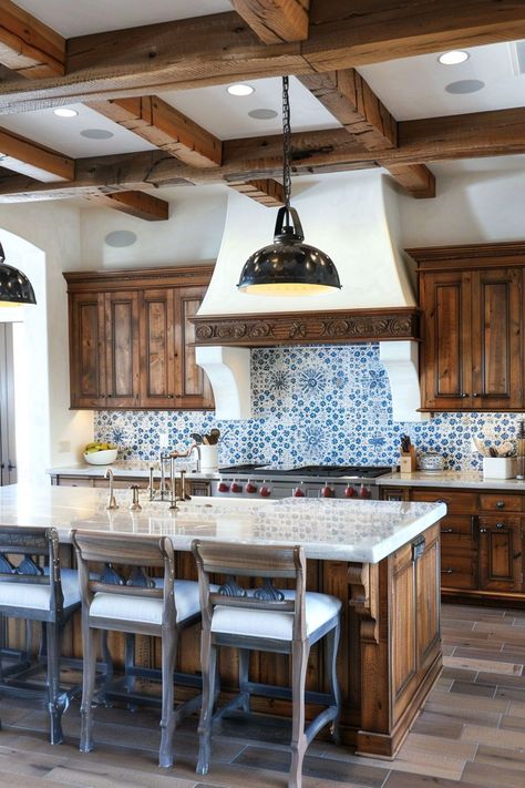 Uncover the beauty of Spanish villa kitchens, where traditional designs meet the timeless appeal of terracotta. Our ideas showcase how to blend these elements with stylish cabinets, creating a kitchen that's both functional and reminiscent of the sunny landscapes of Spain. Kitchen Remodel Mexican Style, Spanish Villa Kitchen Hacienda Style, Old Spanish Style Homes Kitchen, Hacienda Style Homes Kitchen, Spanish Mediterranean Interior Design, Spanish Hacienda Kitchen, Spanish Villa Kitchen, Spanish Homes Interior, Modern Hacienda Kitchen