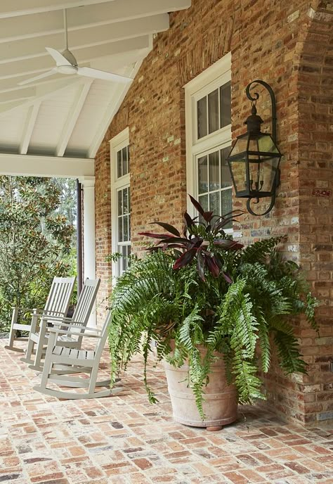 Brick House with brick porch Brick House with brick flooring on porch Brick is Reclaimed Old Chicago brick with rough mortar Brick House with brick porch ideas Traditional Brick House with brick porch #BrickHouse #brickporch #brick Old Mill Brick Front Porch, Brick House Patio Ideas, Brick Front Porch Decor, Brick House Garden, Old Brick Floor, Brick House Back Porch, Red Brick With White Siding, Exterior Paint Colors For House With Old Chicago Brick, Chicago Brick Floor