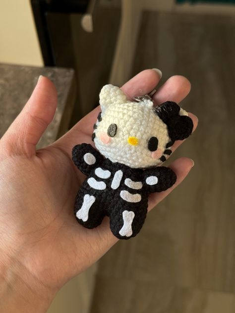 insta: @uqem.studio  In stock! Crochet Hello Kitty Keychain, Sanrio Skeleton, Gothic Crochet Patterns Free, Skeleton Crochet Pattern, Hello Kitty Crochet Pattern, Skeleton Crochet, Crochet Pattern Keychain, Hello Kitty Skeleton, Halloween Sanrio