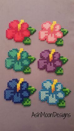 Perler Bead Hibiscus Flowers by AshMoonDesigns on Etsy Perler Bead Designs, Perler Beads Ideas, Hama Art, Bead Curtain, Hamma Beads Ideas, Easy Perler Bead Patterns, Melty Bead Patterns, Pearl Beads Pattern, Easy Perler Beads Ideas