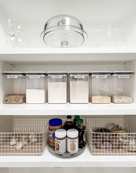 These two photos are showing pantry organization for baking supplies. The first photo has containers on shelves that have different types of baking supplies (like flour and sugar) inside of them, and two mesh baskets on a lower shelf with more supplies inside. The second photo has all of the same containers but they are empty. Oxo Pop Containers Pantry, Oxo Pop Containers, Organized Pantry, Product Placement, The Container Store, Baking Set, Pantry Door, Pantry Design, Container Store