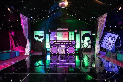 80s Style Acrylic Backdrop.  This freestanding backdrop which is illuminated from behind, would be perfect for any 80s themed event party!  The backdrop is supplied with three Batten lights which can be set to any colour in the RGB spectrum. They can be set to scroll through the colours or flash like at a disco! Retro Theme Party, Bollywood Theme, 80s Disco, 80s Theme Party, Disco Theme, 80s Theme, Christmas Party Themes, Event Props, Prop Hire