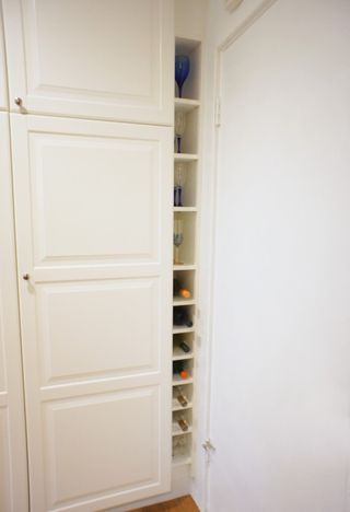 Materials: Billy Bookcase 15 3/4″ by 79 1/2″ white I had an opening of about 6″ in width between my IKEA pantry cabinet and my wall. I took a 15″ wide white Billy Bookcase and cut the back, top, botto Ikea Wine Rack Hack, Ikea Hack Wine Storage, Ikea Wine Rack Hack Ideas, Gnedby Ikea Ideas, Ikea Gnedby, Ikea Wine Rack, Wine Rack Kitchen, Tall Wine Rack, Expedit Hack