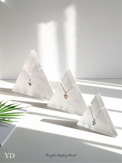 Triangle Clear Acrylic Necklace Display Stand for jewelry display. It works well for showcasing your jewelry neatly on a counter top, storefront, trade shows. They help the potential buyers visualize the jewelry. You could also use it to take jewelry photography, it'll present your products in a professional way. Jewelry not included. Material Acrylic Dimensions As the picture shown. Please note The item you receive may be a little different from the one we show on the picture due to the natural Minimalist Jewelry Wall Display, Stand Jewelry, Necklace Display Diy, Acrylic Jewelry Display, Modern Jewelry Display, Retail Jewelry Display, Jewelry Display Box, Earring Display Stands, Jewelry Wall